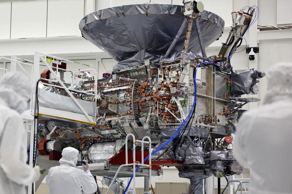 The NASA Europa Clipper spacecraft is viewed inside a Spacecraft Assembly Facility clean room at NASA's Jet Propulsion Laboratory in Pasadena, California.