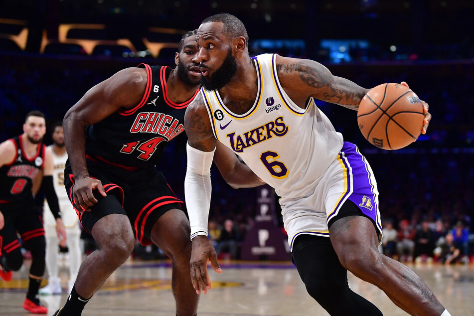 Los Angeles Lakers forward LeBron James moves to the basket against Chicago Bulls forward Patrick Williams during the first half at Crypto.com Arena.