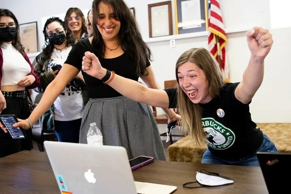 Starbucks baristas in Knoxville celebrate after their union election ballots were tallied by the NLRB.