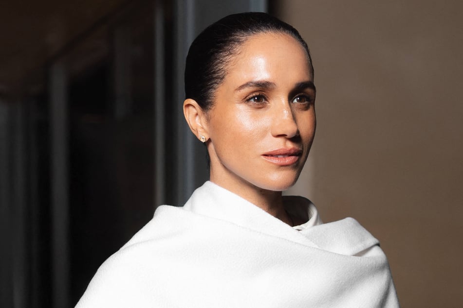 Meghan Markle invited herself to Paris Fashion Week this month, the creative director of Balenciaga has revealed.