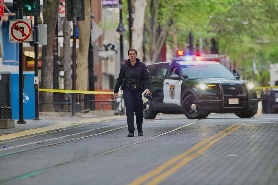Sacramento Police Chief Kathy Lester walks the scene of the mass shooting.