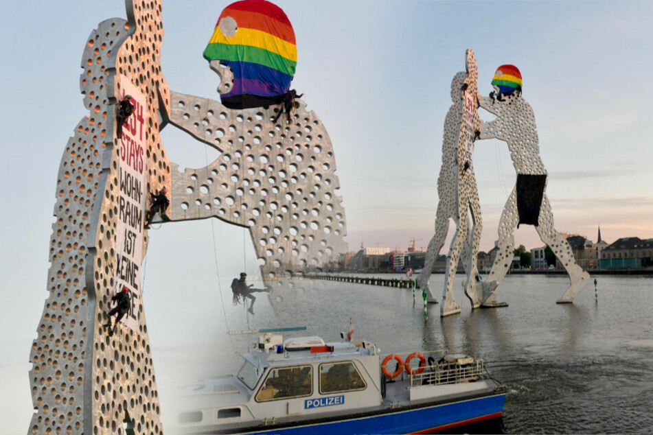 Aktivisten erklimmen Molecule Man und hinterlassen Botschaft