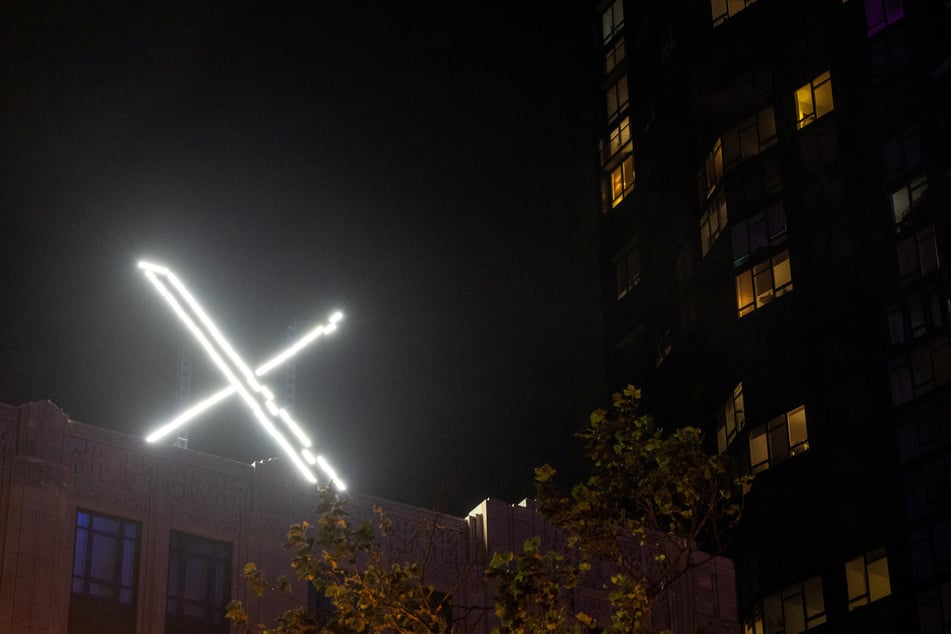 The X logo is pictured on the top of the social media platform's headquarters in downtown San Francisco, California.