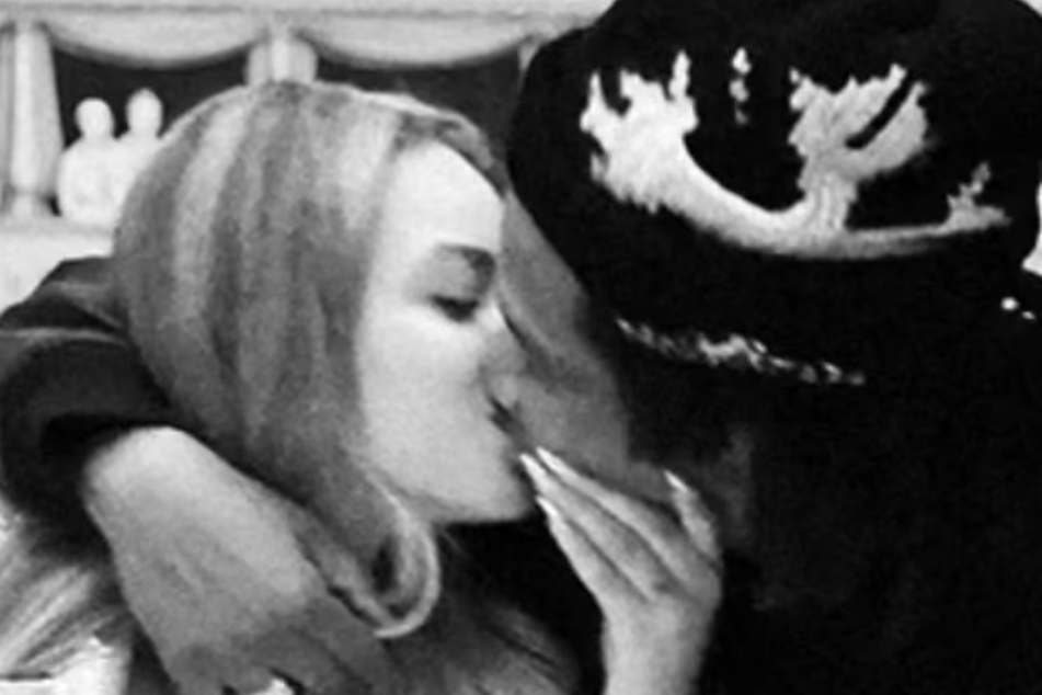 Beyoncé and Jay-Z share a sweet kiss while spending time together in Las Vegas.