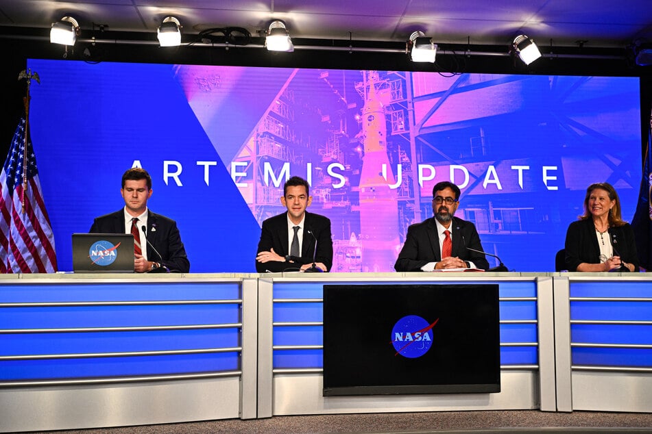 NASA Administrator Jared Isaacman (2L), NASA Associate Administrator Amit Kshatriya (2R), and Lori Glaze (R), associate administrator for NASA’s Exploration Systems Development Mission Directorate, speak during a press conference to provide an update on the Artemis II mission at the Kennedy Space Center in Cape Canaveral, Florida, on Friday.