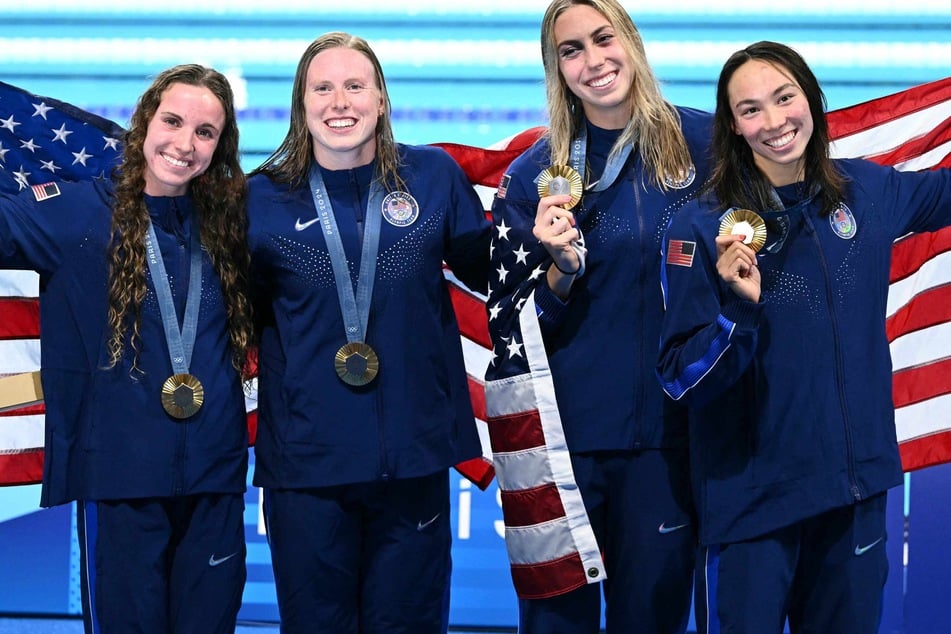 US wins Olympic gold and sets world record for women's 4x100m medley swim relay