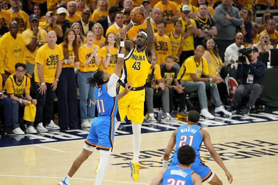 Indiana Pacers forward Pascal Siakam shoots the ball against Oklahoma City Thunder guard Isaiah Joe during the second half of Game 6 of the 2025 NBA Finals.