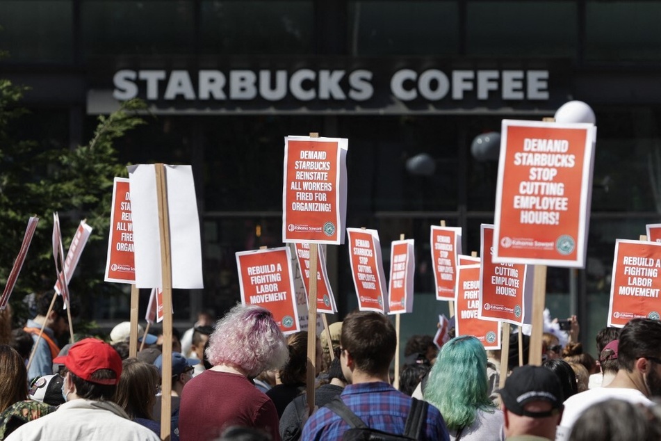 Starbucks Workers United members and supporters gather for a "Fight Starbucks' Union Busting" rally and march in Seattle, Washington, on April 23, 2022.