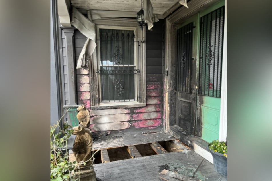 The front porch of The Satanic Temple after the fire Friday night.