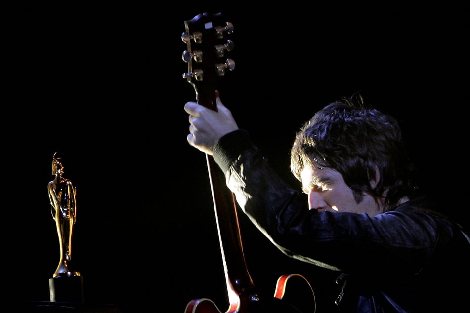 Noel Gallagher of Oasis performs at the Brit Awards at the Earls Court Arena in London in February 2007.