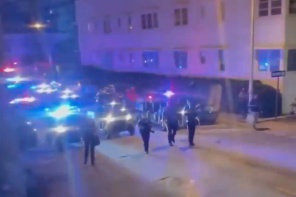 Miami Beach police move in to disperse a crowd of spring breakers.