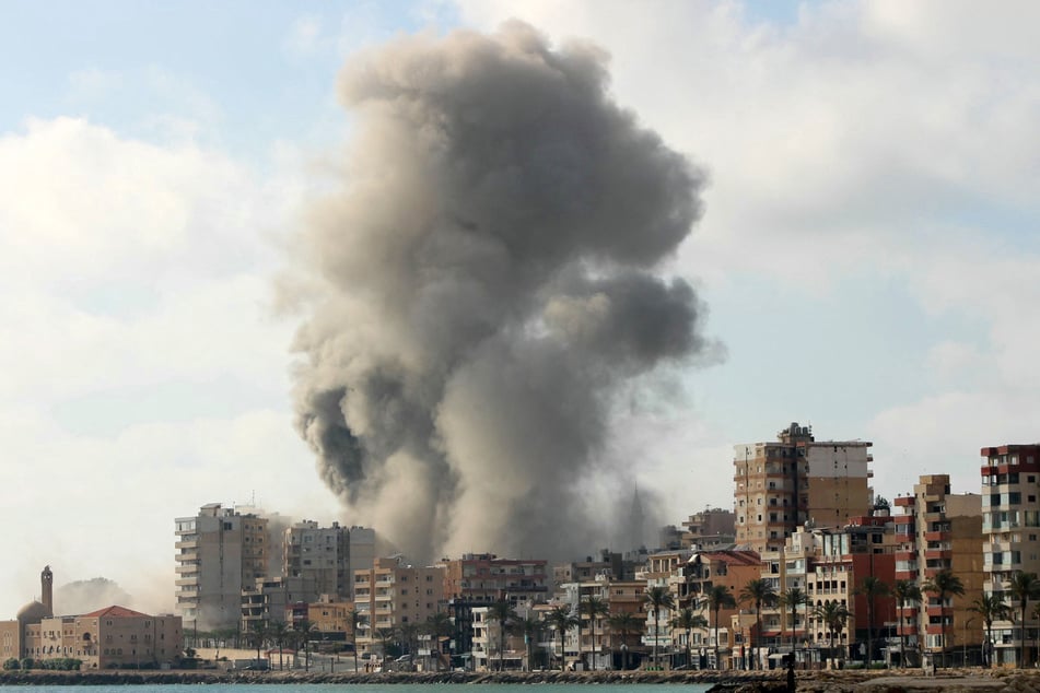 Smoke rises from the site of an Israeli airstrike on a neighborhood in the southern Lebanese coastal city of Tyre on June 7, 2026.