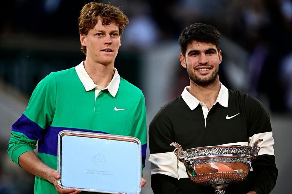 Their most recent clash was in last month's phenomenal five and a half hour French Open final, when Alcaraz (r.) rallied from two sets down and saved three match points to defend his clay-court title.