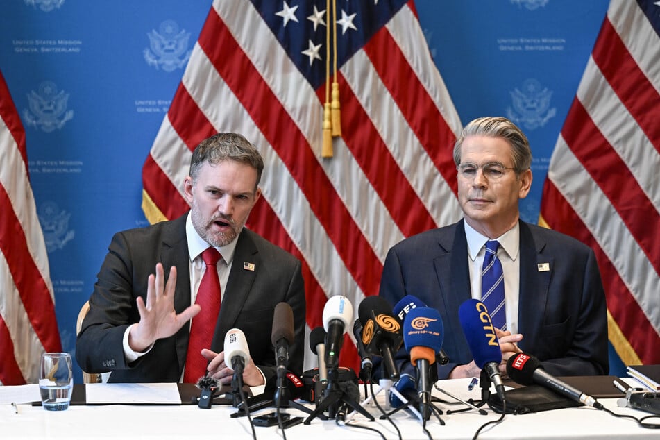 Treasury Secretary Scott Bessent (r.) and Trade Representative Jamieson Greer hold a news conference in Geneva on May 12, 2025, to give details of "substantial progress" following a two-day closed-door meeting between US and China top officials aimed at ending the tariff war.
