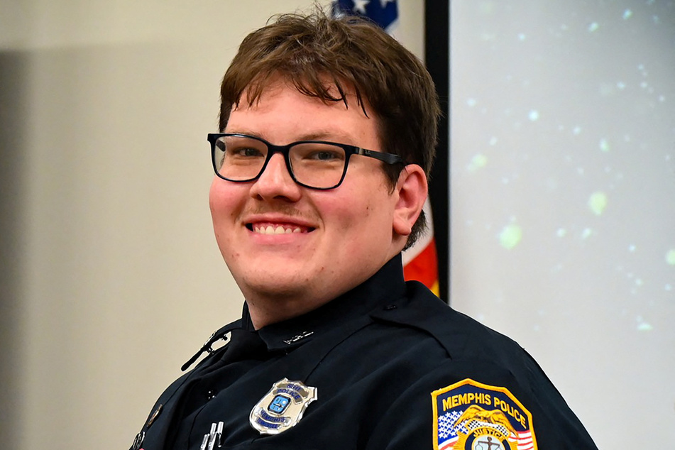 Memphis Police Department officer Preston Hemphill poses at a graduation ceremony for the 97th Crisis Intervention Class in Memphis, Tennessee, on July 21, 2022.