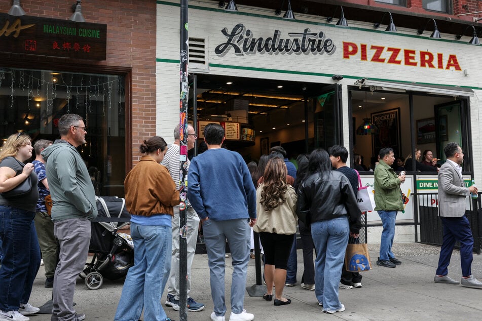 New York's L'industrie Pizzeria is just one of many spots that has sparked lengthy lines for its offerings.