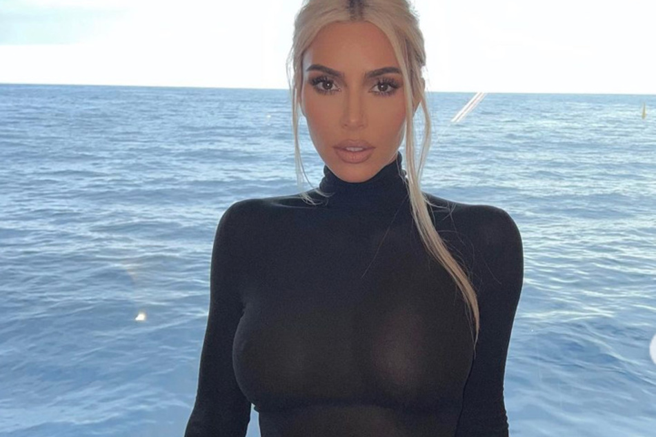 Kim Kardashian opened up about her 2016 Paris robbery while admitting she's "glad" that she was the one mugged and not her sisters.