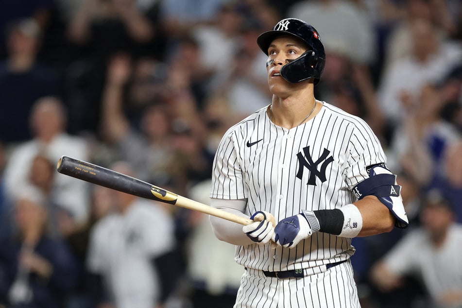 Aaron Judge of the New York Yankees hits a three-run home run against the Toronto Blue Jays during the fourth inning in Game 3 of the American League Division Series at Yankee Stadium on October 7, 2025.