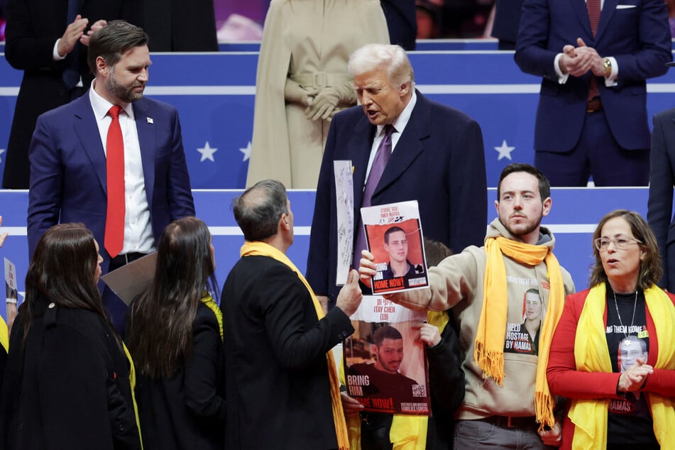 President Donald Trump and Vice President J.D. Vance are joined during an Inauguration Day rally by relatives of Israeli hostages who have been held in Gaza since October 7, 2023.