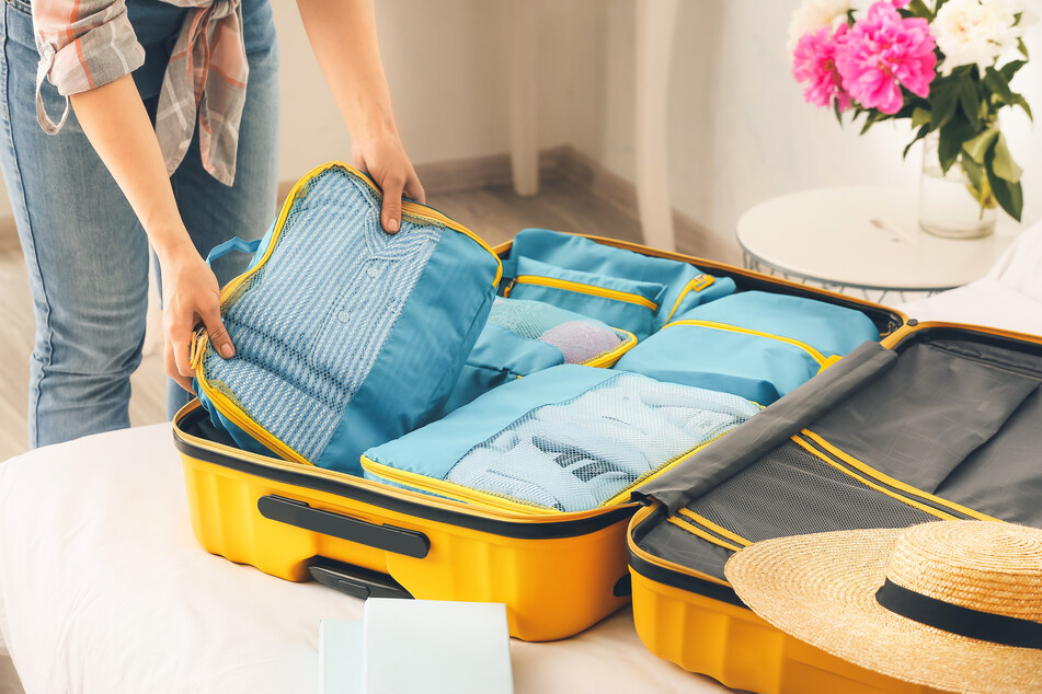 Insert organizers are a great way to save space and keep outfits together (stock image).