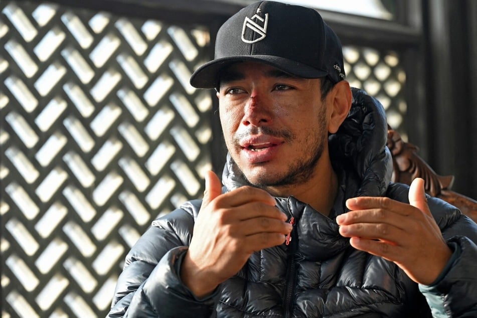 Nepali mountaineer Nirmal Purja speaks during a 2021 interview with AFP in Skardu, Pakistan.