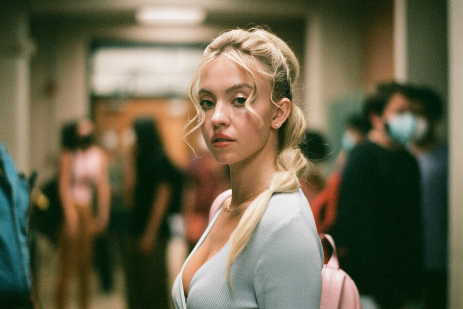 Sydney Sweeney portrays Cassie Howard, classmate of Rue who slept with her best friend's ex-boyfriend Nate, played by Jacob Elordi.