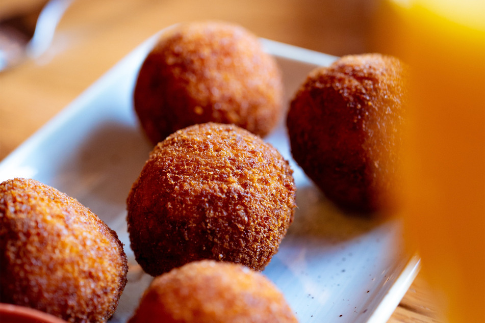 Deep-fried balls of rice, meat, and cheese... where could you go wrong?