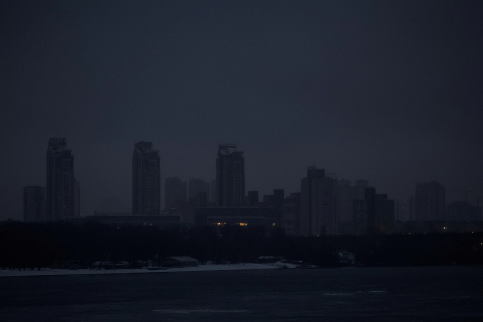 Kyiv shrouded in darkness as Russian missile and drone attacks cause widespread power outages.