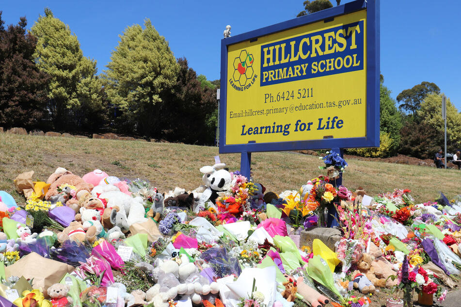 Flowers and tributes outside Hillcrest Primary School in Devonport, Australia, where the tragedy took place.