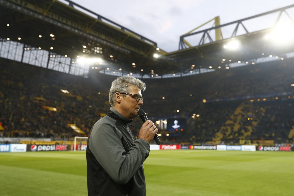 Zwangspause für eine Klub-Ikone! Norbert Dickel (63) verpasst das kommende BVB-Heimspiel gegen Werder Bremen.