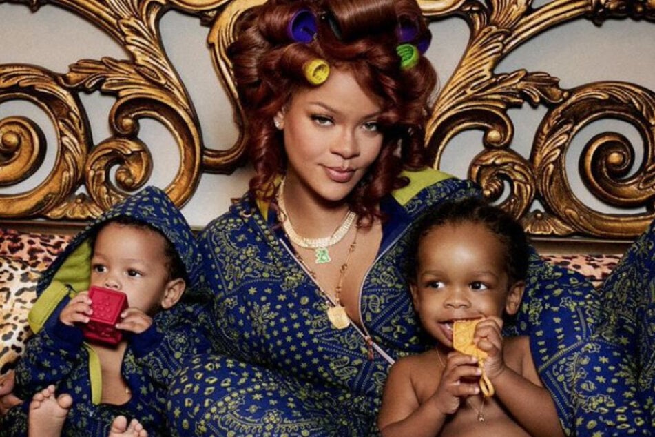 Rihanna and her sons RZA (r.) and Riot Rose (l.) are ready for the holidays with the Fenty moguls newest line, Forever Savage Onesies.