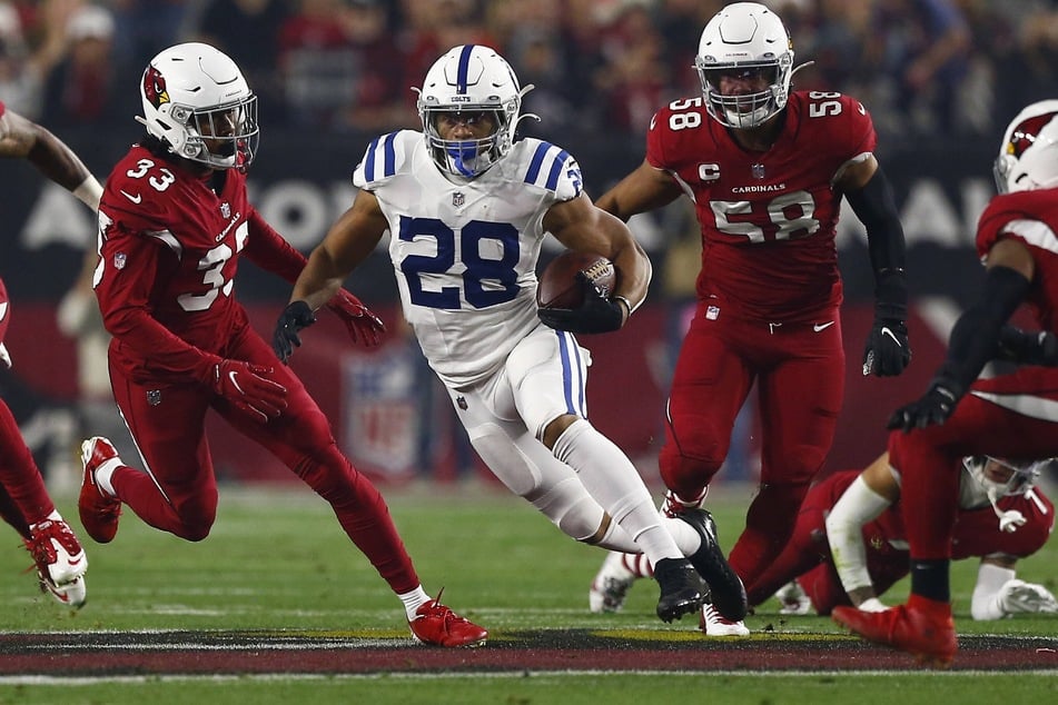 Colts Running Back Jonathan Taylor (c) rushed for 108 yards against the Cardinals.