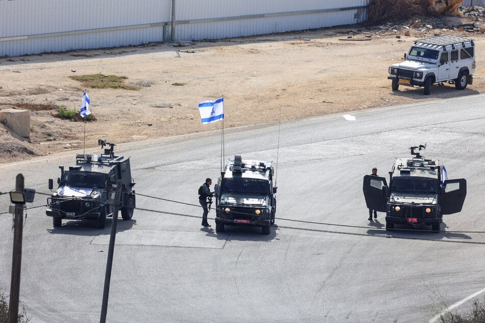 Israeli forces stand guard at the Ofer military prison located between Ramallah and Beitunia in the illegally occupied West Bank.