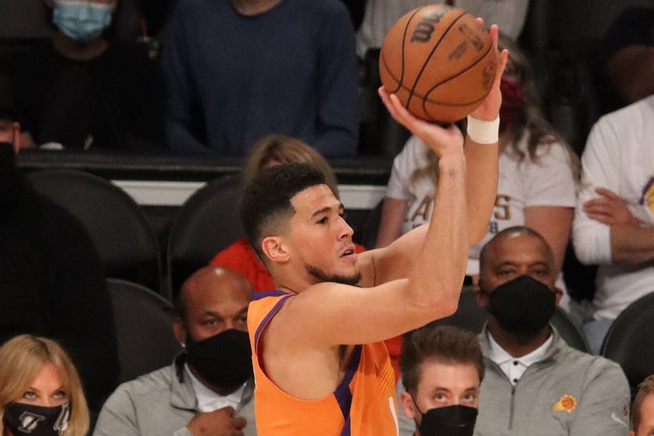 Devin Booker led his team with 30 points against the Nets on Saturday night.