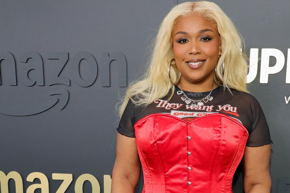 Lizzo has spilled the tea on why her highly anticipated album Love in Real Life is on hold.