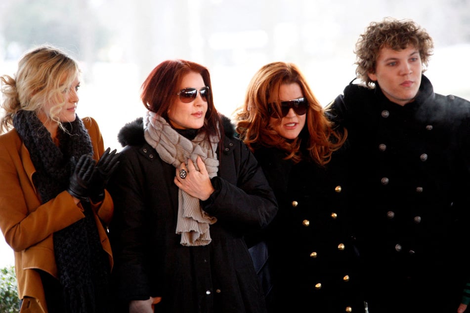 From l. to r.: Riley Keough, Priscilla Presley, Lisa Marie Presley, and Benjamin Keough welcome fans during the 75th birthday celebration for Elvis Presley in Memphis, Tennessee, on January 8, 2010.