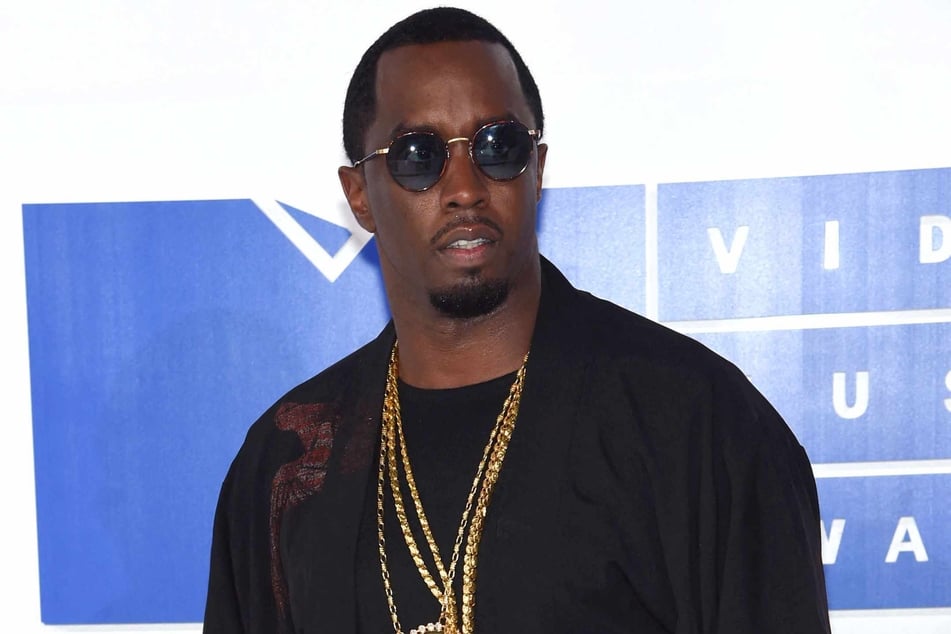 Superstar rapper and music industry mogul Sean "Diddy" Combs has been sued by a former adult film star for sexual assault and sex trafficking, court filings showed.