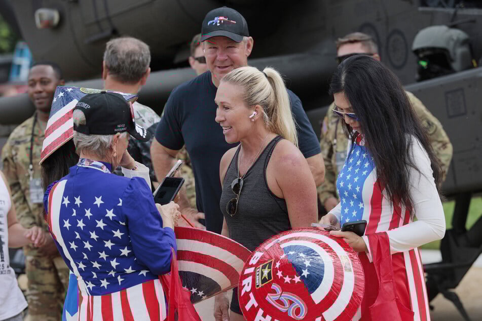 Marjorie Taylor Greene's boyfriend, who's also a White House correspondent, is calling on President Donald Trump to be nicer to her.