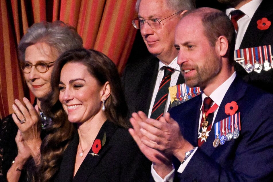 Kate Middleton joined Prince William (r.) at Saturday's Festival of Remembrance commemorative concert at the Royal Albert Hall in London.