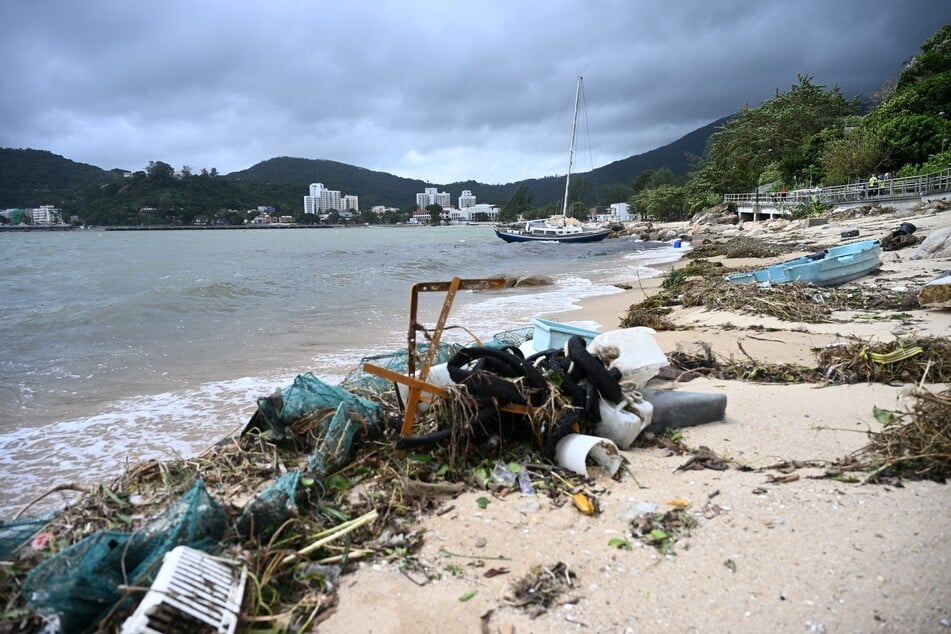 A sailboat has run aground on Silvermine Beach after Super Typhoon Ragasa passed close to Hong Kong, on September 25, 2025.