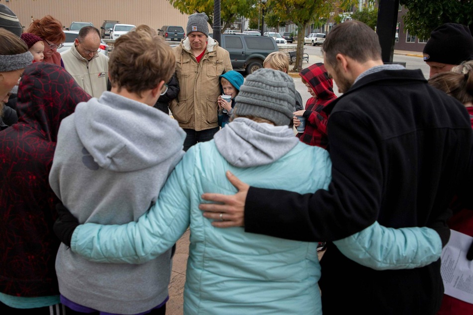 A vigil in Hart, Michigan for members of the Dunkard Brethren Church congregation, who were among the missionary group kidnapped by a gang in Haiti.
