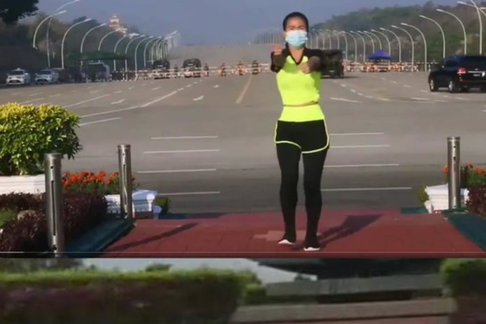 Woman accidentally catches coup on camera while filming workout video