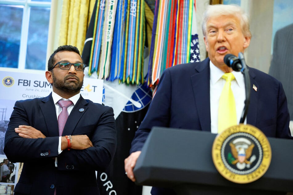 Kash Patel (l.) and President Donald Trump during a press conference in the Oval Office of the White House on October 15, 2025.