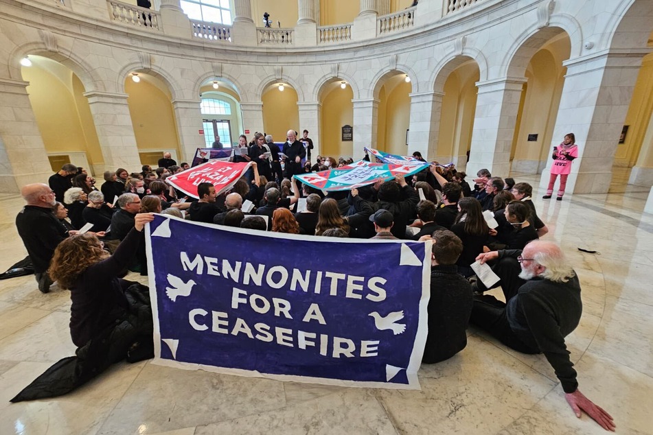 Demonstrators with Mennonite Action demand a permanent ceasefire in Gaza during a rally in Washington DC on January 16, 2024.