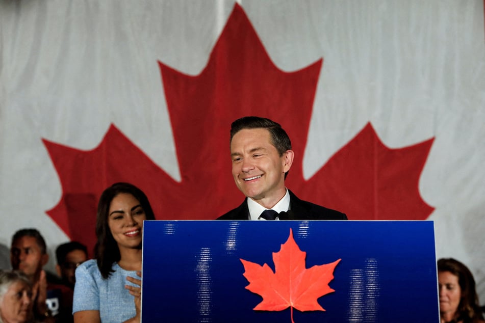 Canada's federal Conservative leader Pierre Poilievre takes the podium after winning a by-election in Alberta's Battle River-Crowfoot riding, after he lost his long-held Ottawa constituency in the general election, in Camrose, Alberta, on August 18, 2025.