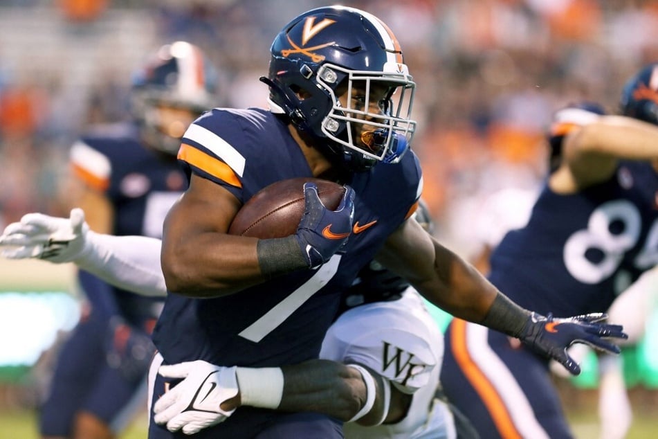 Virginia football player Mike Hollins, who was severely injured during the Virginia shooting on Sunday, has made remarkable progress and began taking his first steps on Wednesday.