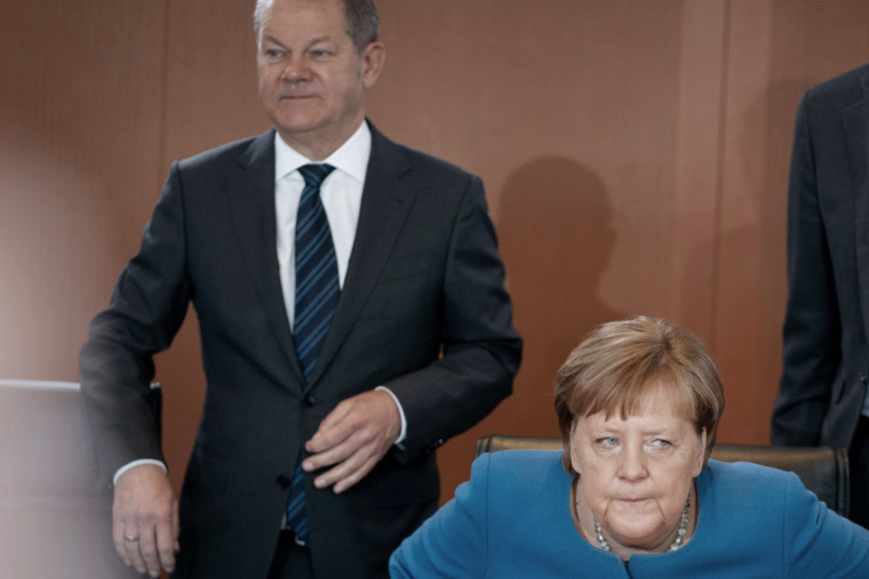 Vizekanzler Olaf Scholz widerspricht Angela Merkel in Bezug auf ihre Aussagen bezüglich "Öffnungsdiskussionsorgien" im Zuge der Corona-Krise.