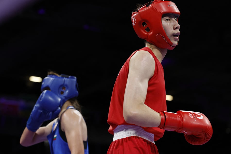 Lin Yu-ting of Taiwan competes against Svetlana Kamenova Staneva of Bulgaria during the women's 57kg quarter-finals at the Paris Olympics.