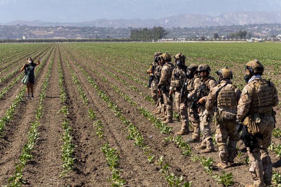 A farm worker was in critical condition on Friday after being injured during a raid by US immigration agents on a legal cannabis farm in California.