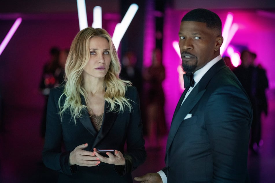 Jamie Foxx (r.) and Cameron Diaz play ex-CIA spies whose secret identities are compromised in Back in Action.